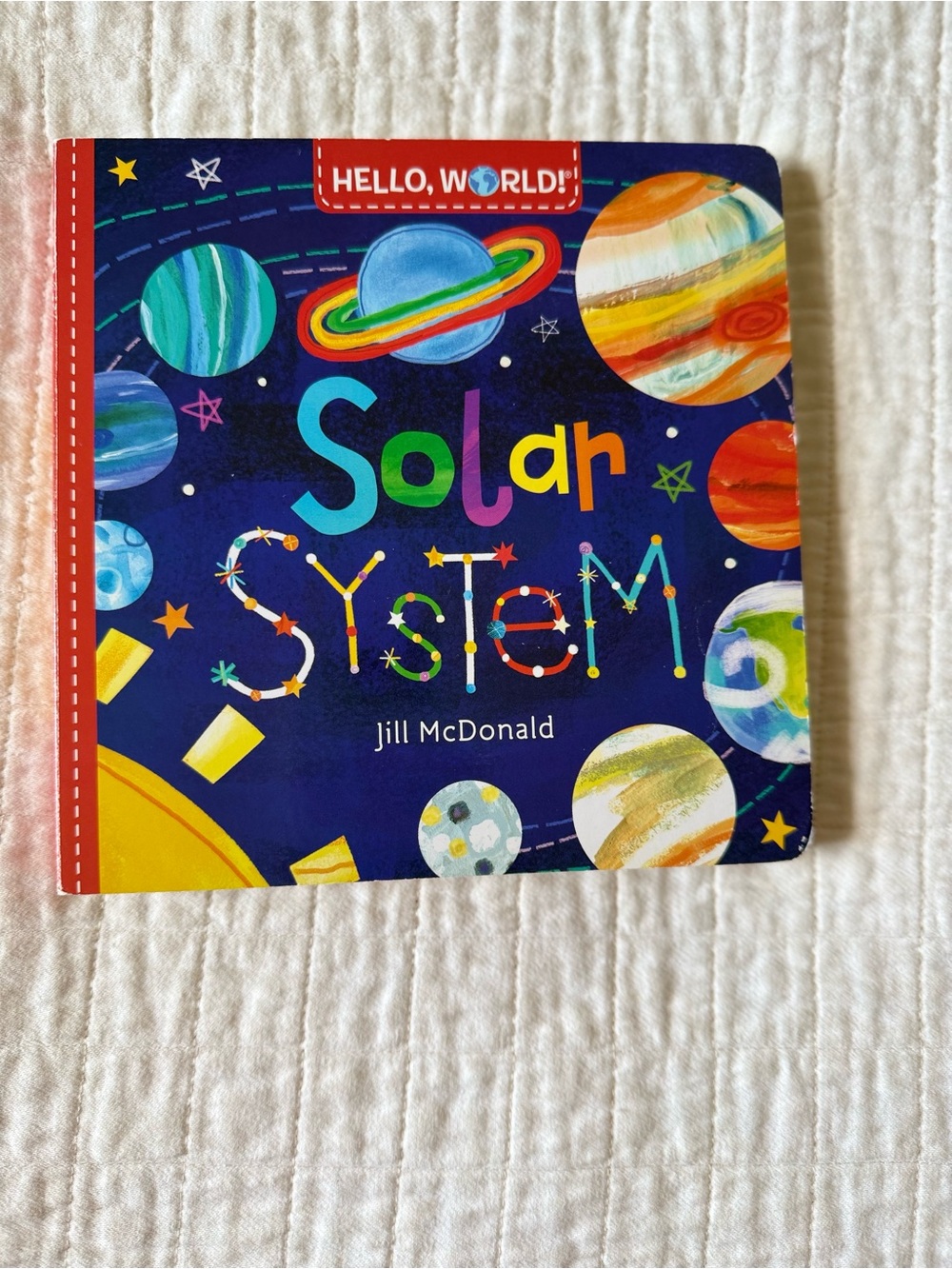 Hello, World! Solar System Board Book by Jill McDonald - Colorful Space Design